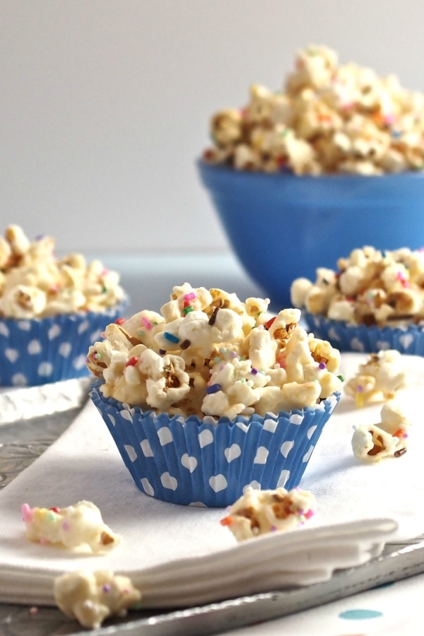 Birthday Popcorn is all dressed up just waiting to party. Kettle Corn, melting wafers, sprinkles & salt. An easy & fun treat for any celebration. Simply Sated