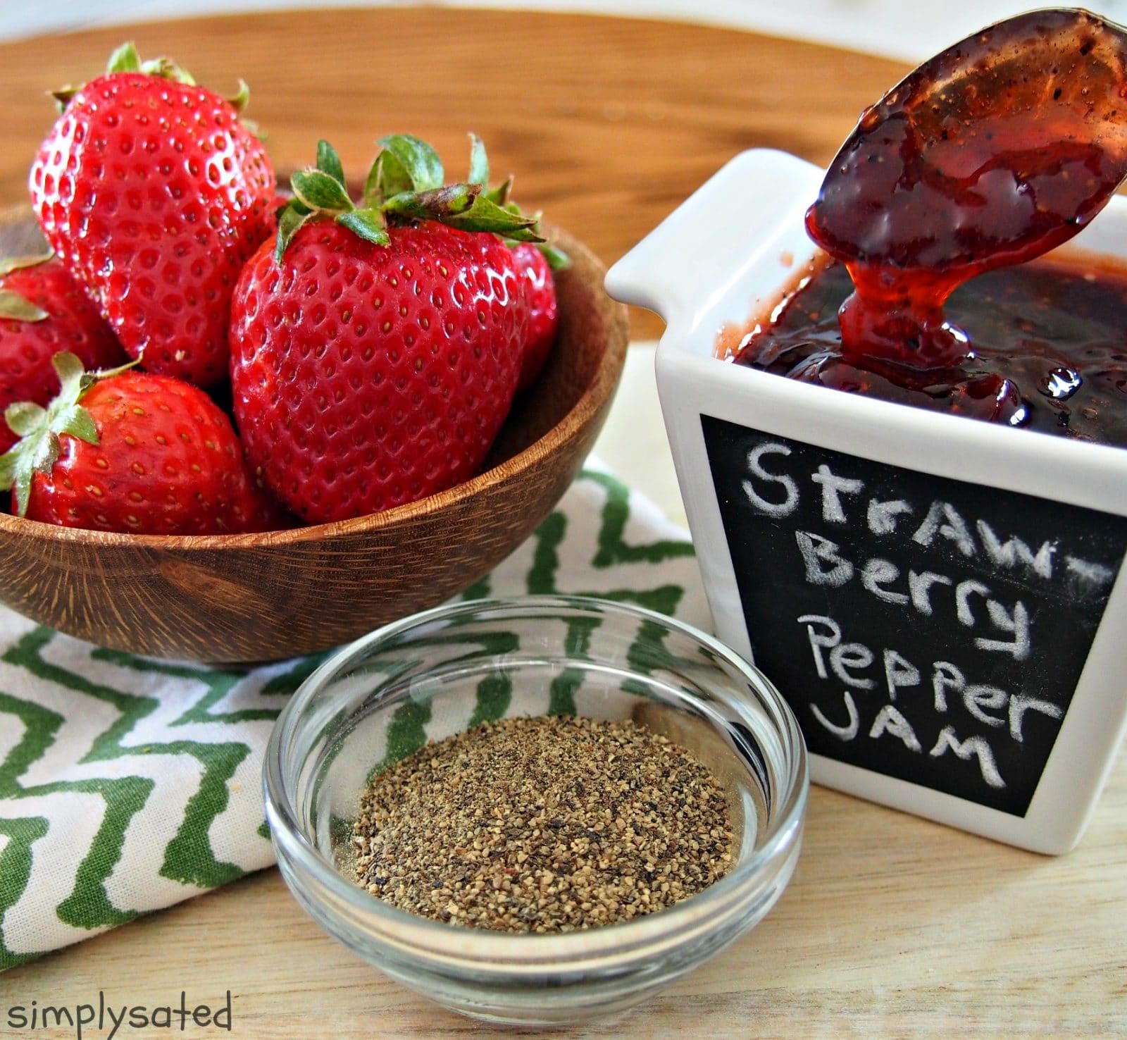 Strawberry, Black Pepper Jam - the perfect strawberry jam infused with just enough black pepper to spice things up. www.simplysated.com
