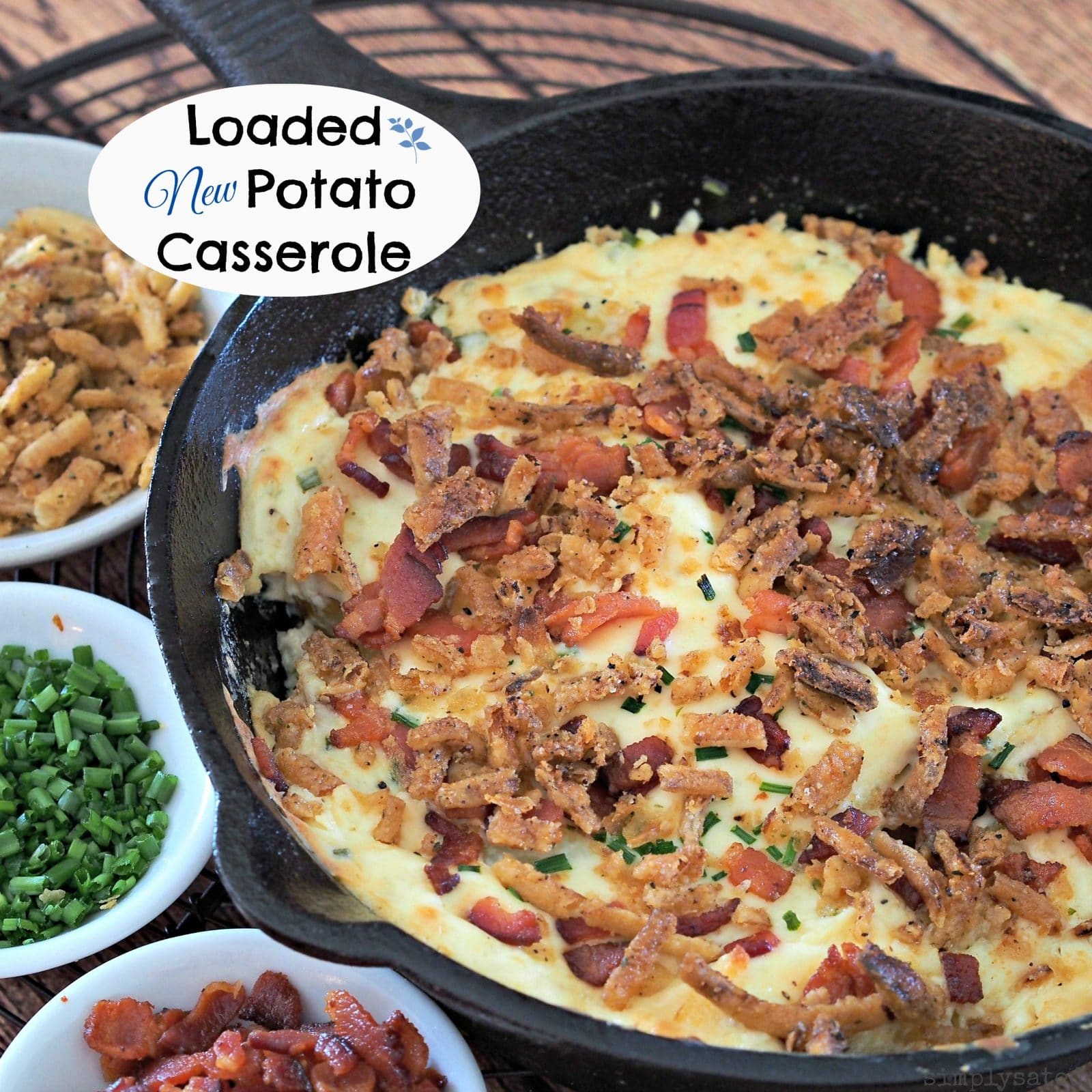 Loaded New Potato Casserole - roasted new potatoes combined with cheese, chives, sour cream and bacon.  Serve as a side or a beautiful appetizer.
