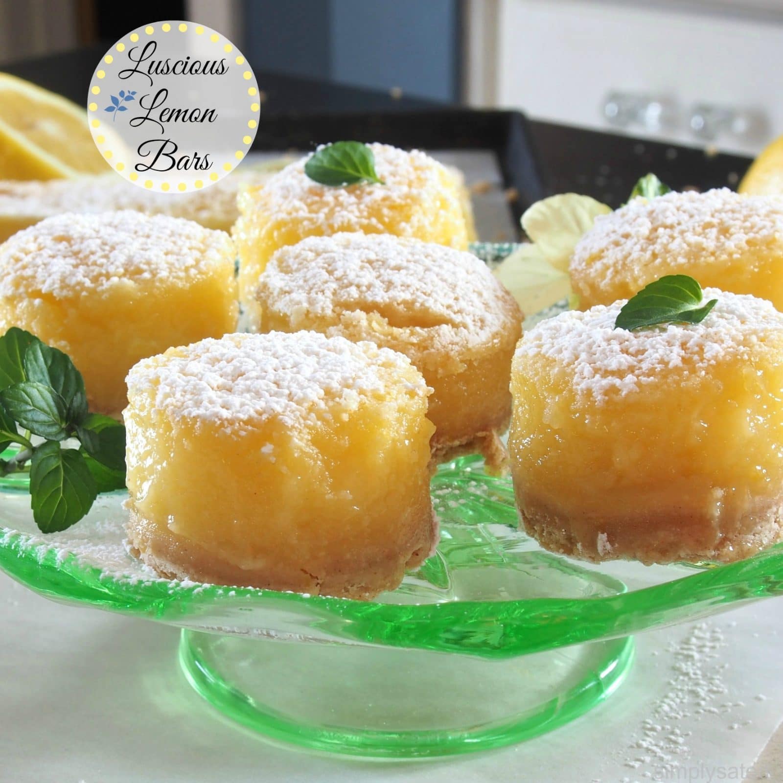 Luscious Lemon Bars - the perfect lemony sweet/tart custard on a shortbread crust. A great traditional dessert. www.simplysated.com