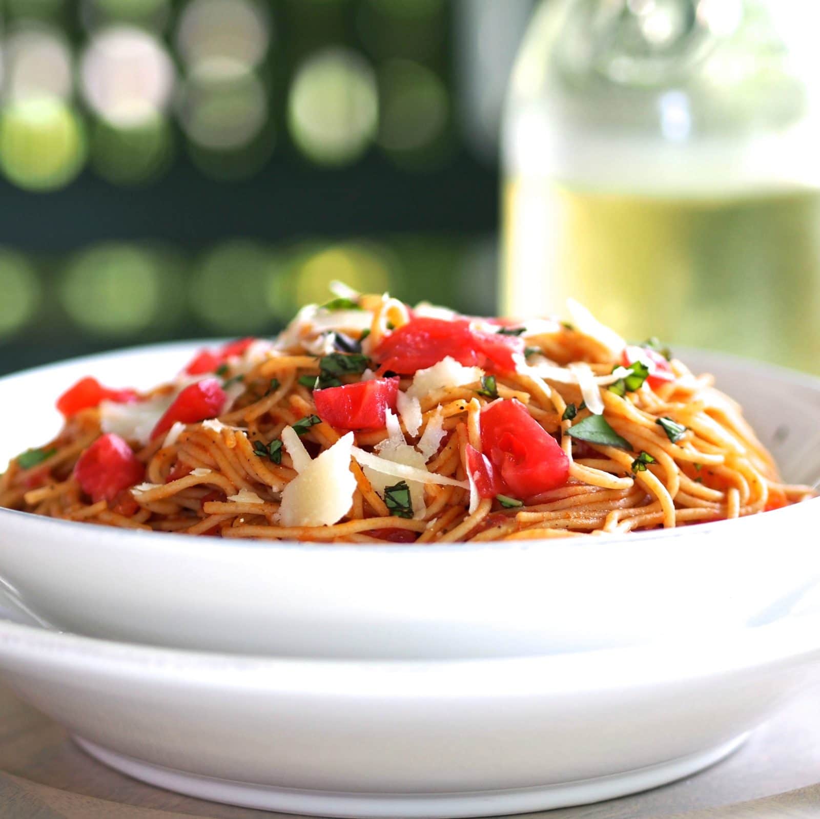 Spaghetti Pomodoro is delicious in its simplicity. Spaghetti, tomatoes, garlic, olive oil, basil and parmesan. simply sated