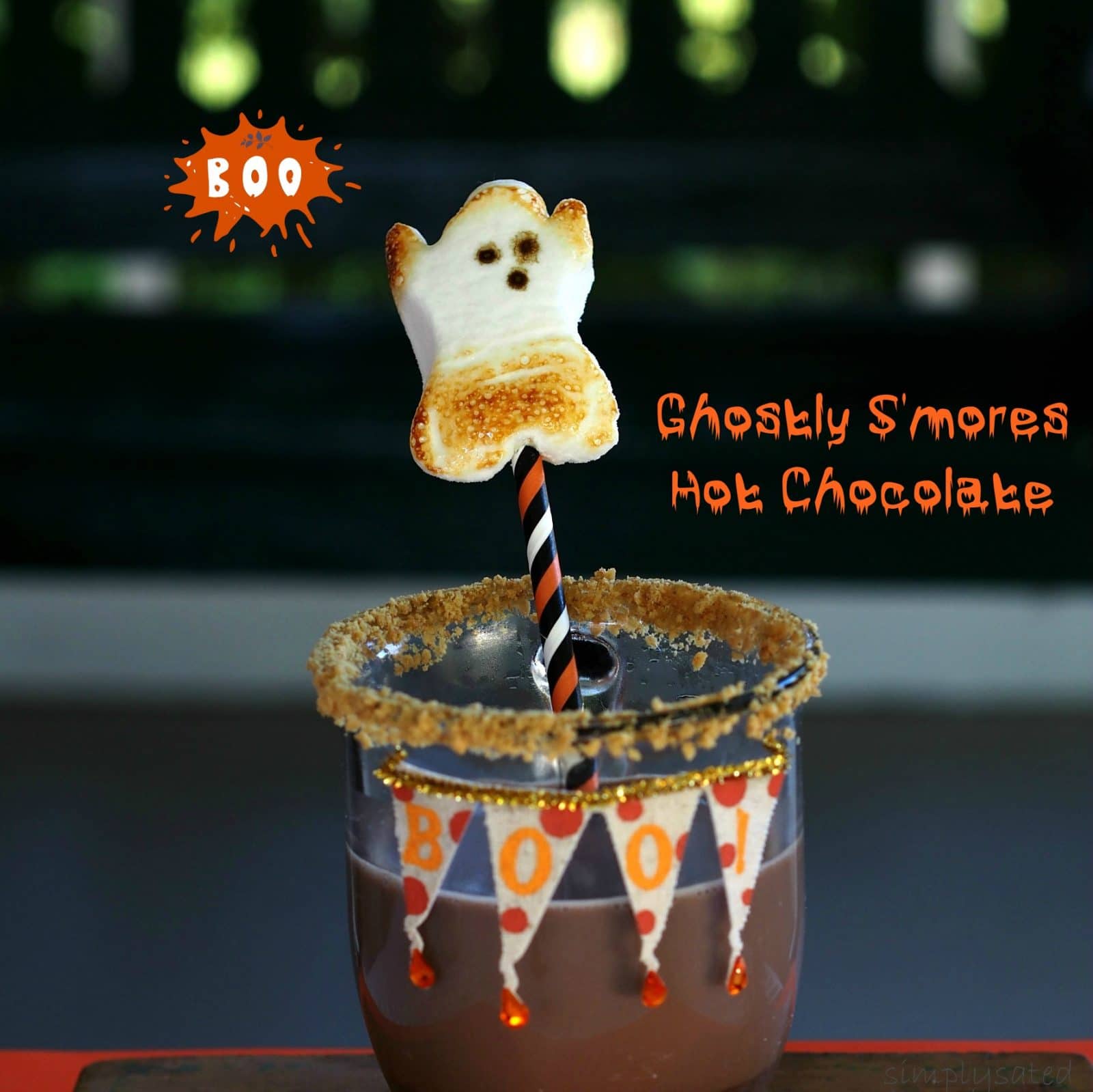 Ghostly S'mores Hot Chocolate - Surprise your guests with this fun drink at your next Halloween party or event. S'mores, hot chocolate & Ghost Peeps. simplysated