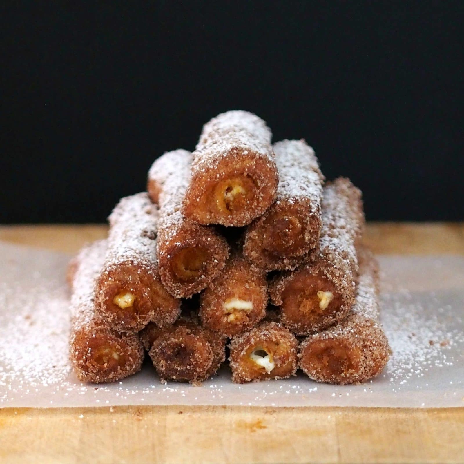 Pumpkin French Toast Roll-ups are an easy & fun way to satisfy your cinnamon cravings. simplysated