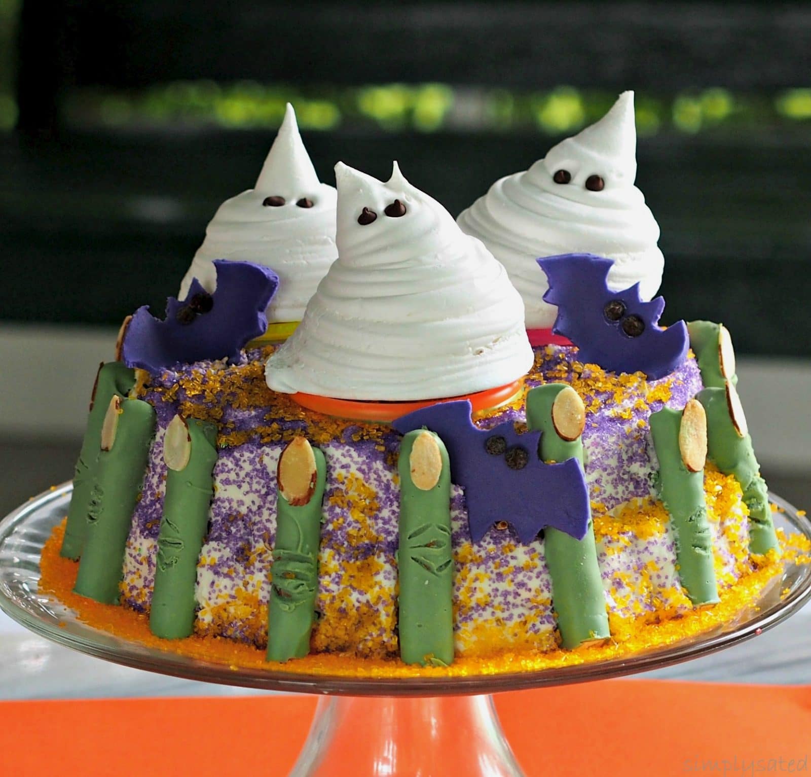 Halloween Glow Cake-lots of fun treats come together to create a dessert all guests will love. simplysated