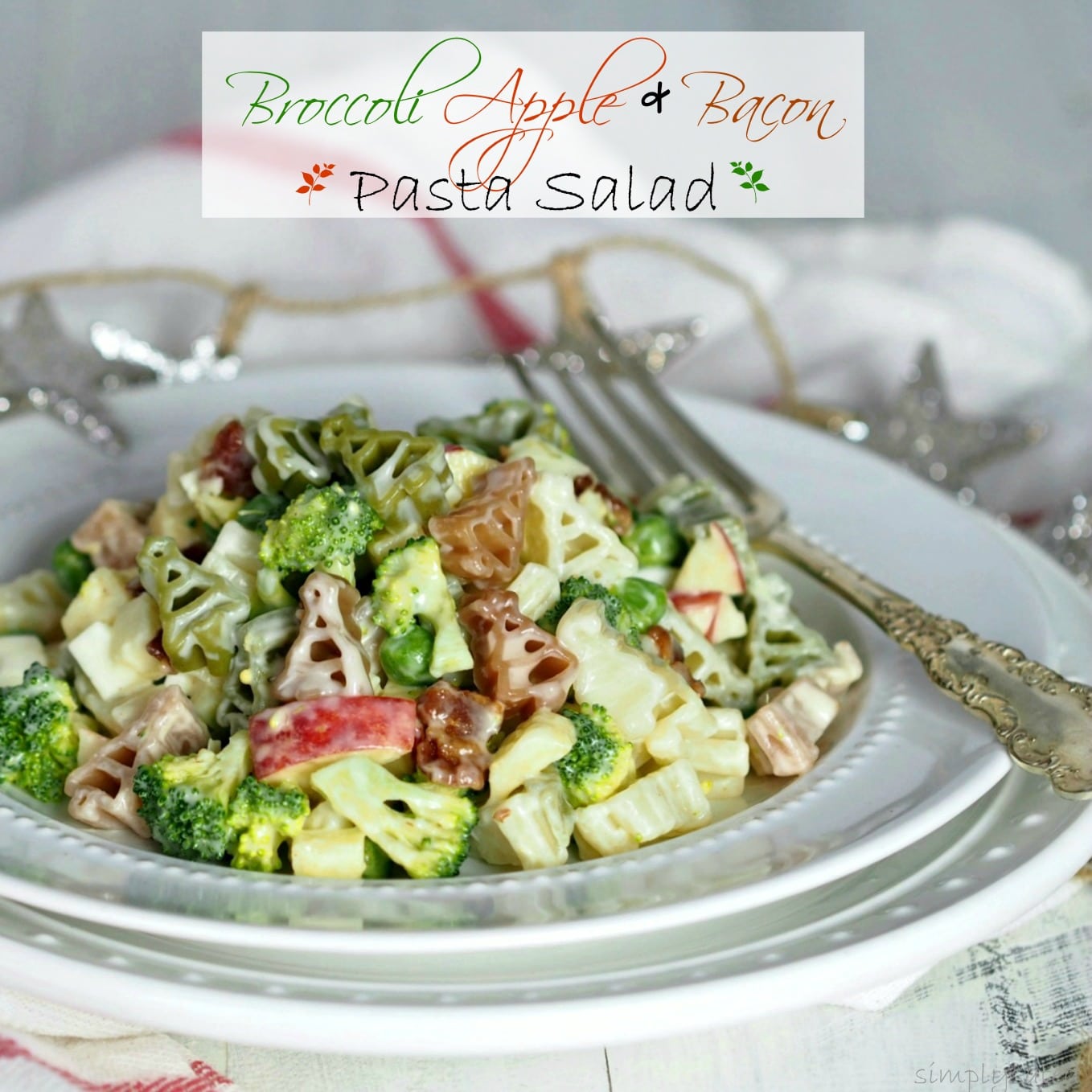 Broccoli Apple & Bacon Pasta Salad has something for everyone. Crunchy broccoli, sweet apple, salty bacon, perfect pasta and a sweet, tangy dressing. Simply Sated