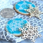 Snowflake Cookies - Using stencil ornaments, any decorated cookie can be turned into a work of art. simplysated