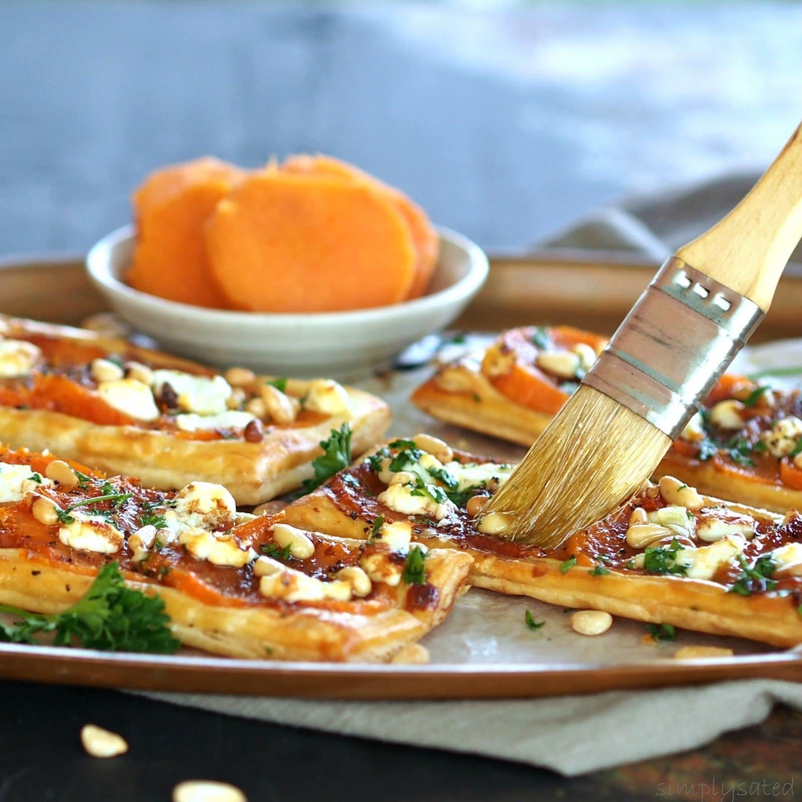 Sweet Potato & Honey Goat Cheese Pizza is just as delicious made with freshly baked sweet potatoes or even leftover sweet potatoes from Thanksgiving.
