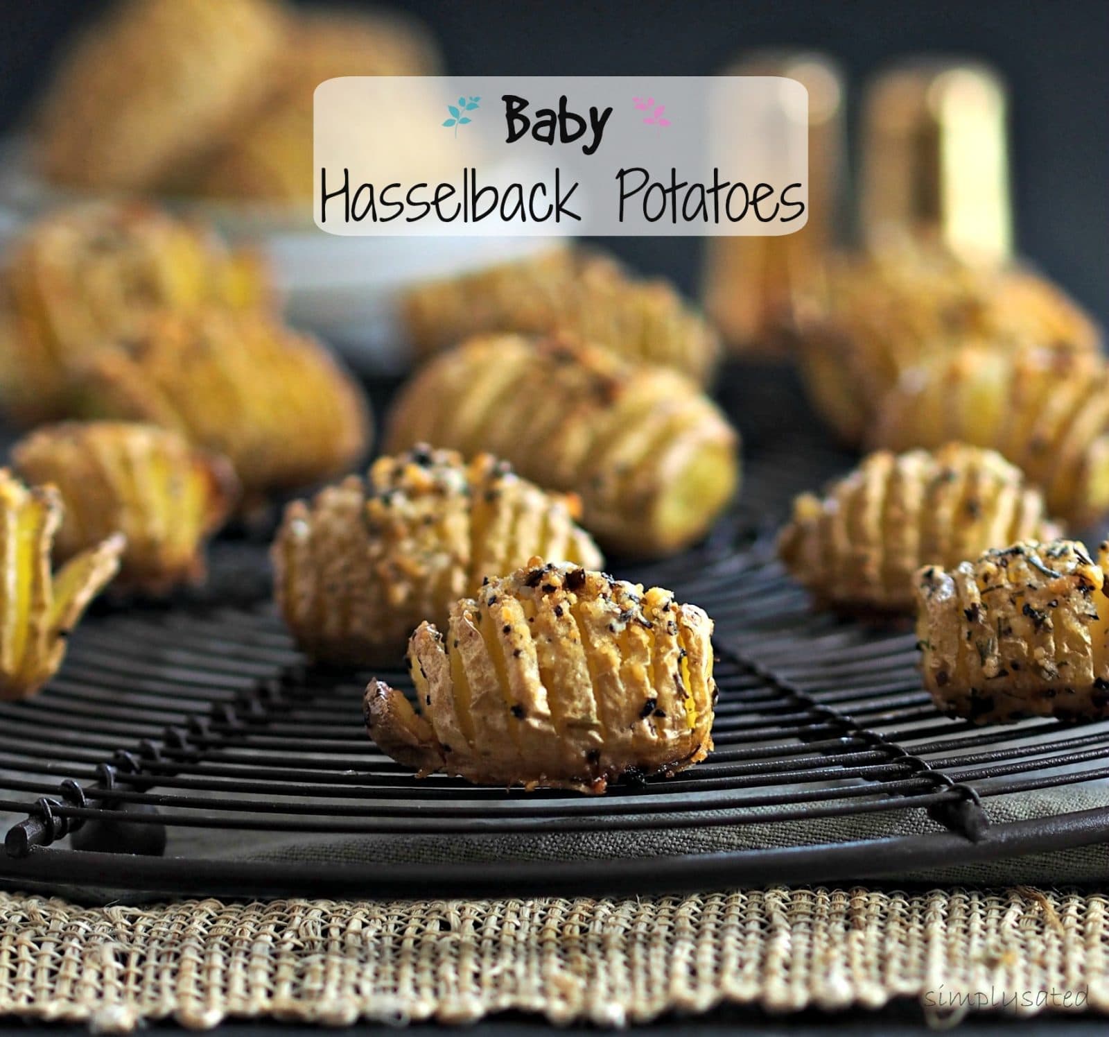 Baby Hasselback Potatoes - the perfect side for a family meal or formal dinner party. Accordion-sliced baby gold potatoes fan open while baking. Simply Sated