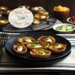 Three-Cheese Mini Potato Skins. The perfect bite-size appetizers. Mini potato skins loaded with three cheeses, bacon, sour cream and green onions. simply sated