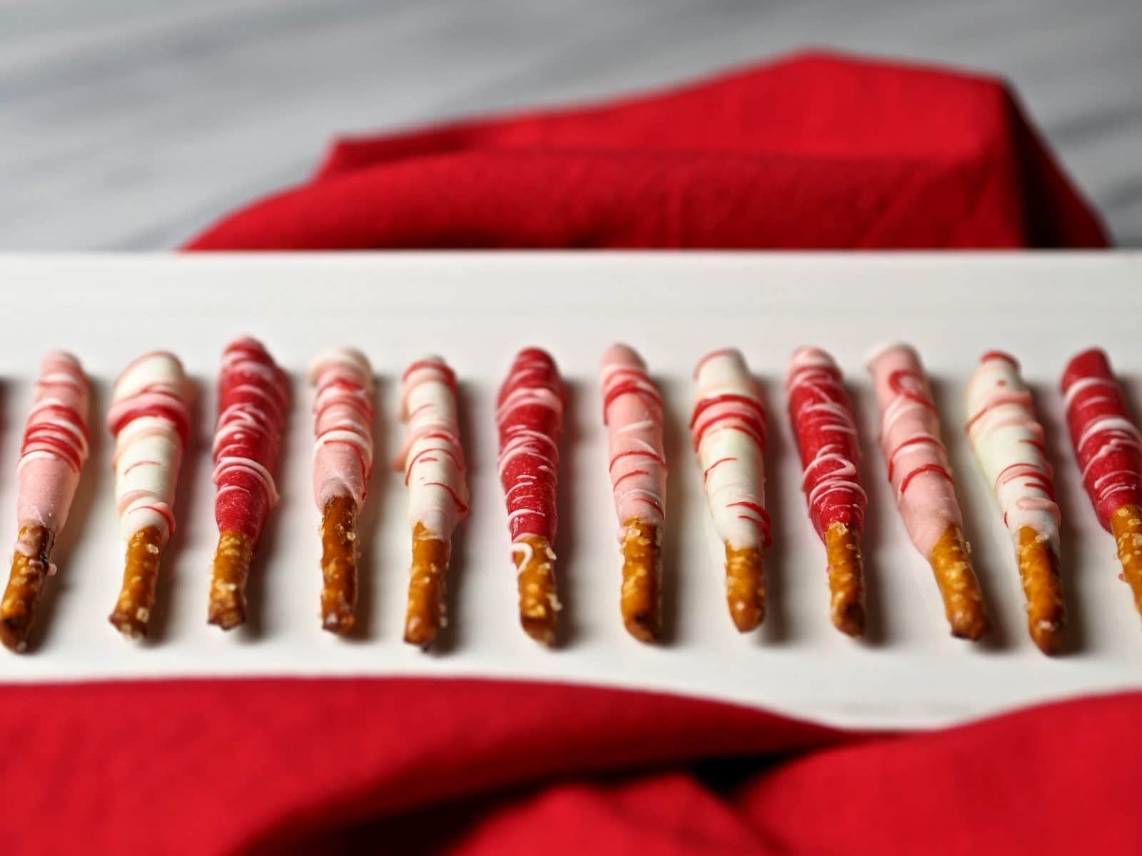 Holiday White Chocolate Pretzels - an easy, tasty and cute treat for any occasion or holiday and for any time of the year. Choose the colors and have fun. simply sated