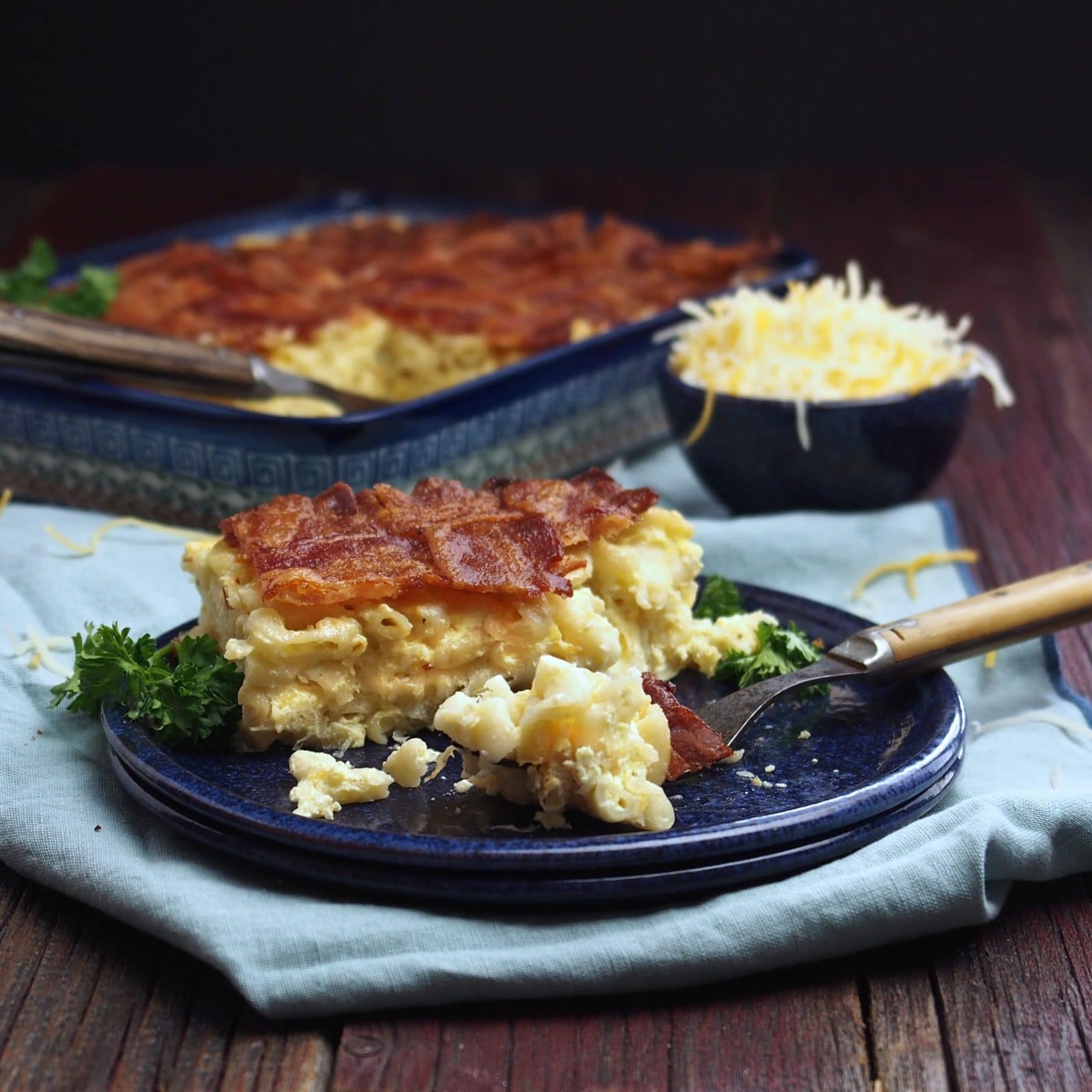 Macaroni & Cheese Quiche with Latticed Bacon - three food favorites come together to create this fabulous dish. Mac 'n Cheese, Quiche and Crispy Bacon. YUM! Simply Sated