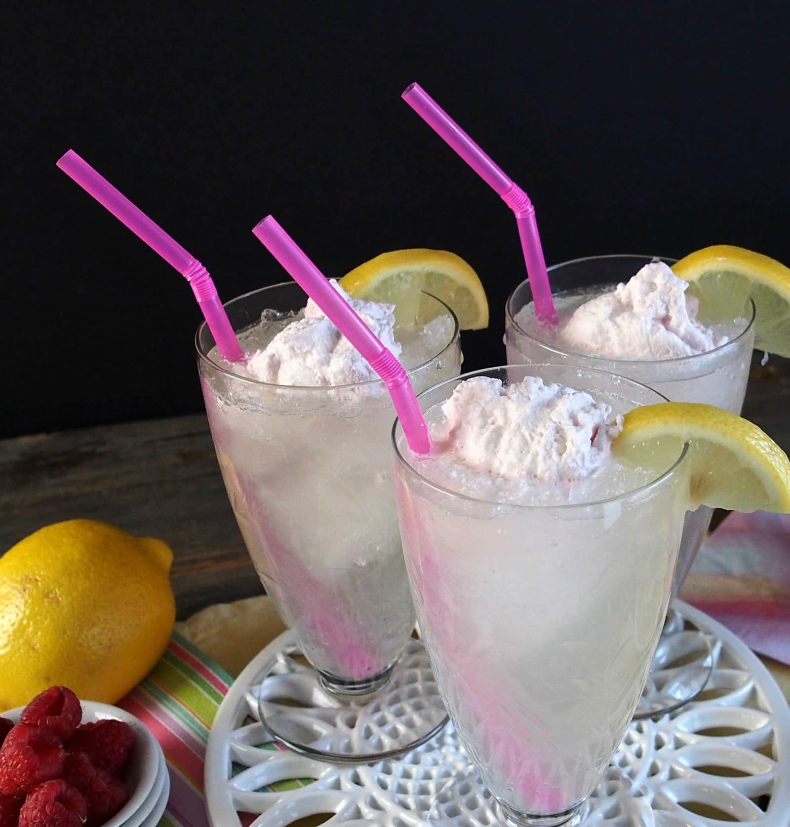 Homemade Lemonade with Raspberry Cream. Fresh squeezed lemonade swirled with Raspberry Mascarpone Cream. So heavenly, it must have been created by angels. Simply Sated