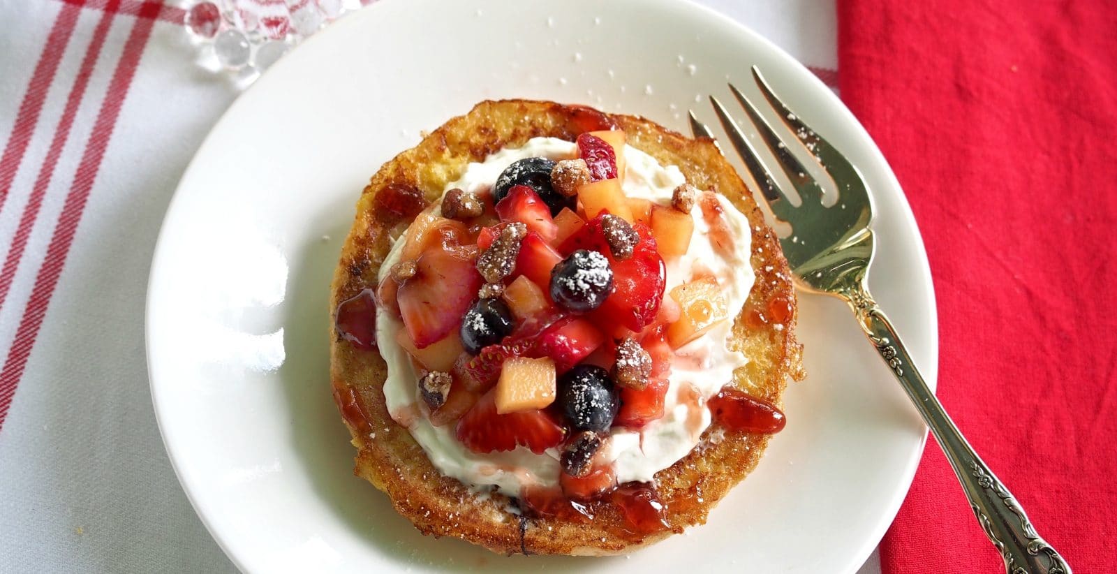 Berry-Topped French Toast Bagels w/Cobblestone Bread Co. Bagels-a great way to start the day. French toasted bagels topped w/fresh berries & cream cheese. Simply Sated
