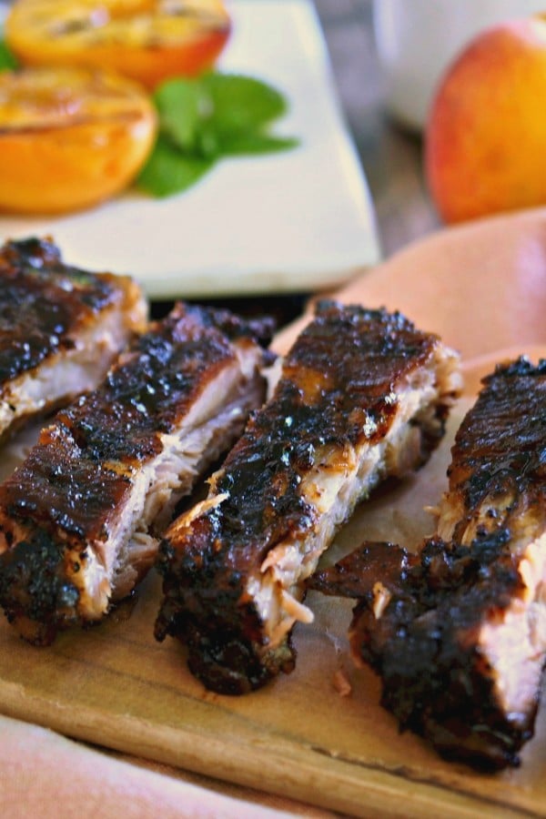 Peach Bourbon Baby Back Ribs. The BEST RIBS EVER!! Perfectly seasoned, fall-off-the-bone, tender ribs baked then grilled with peach bourbon barbecue sauce. Simply Sated