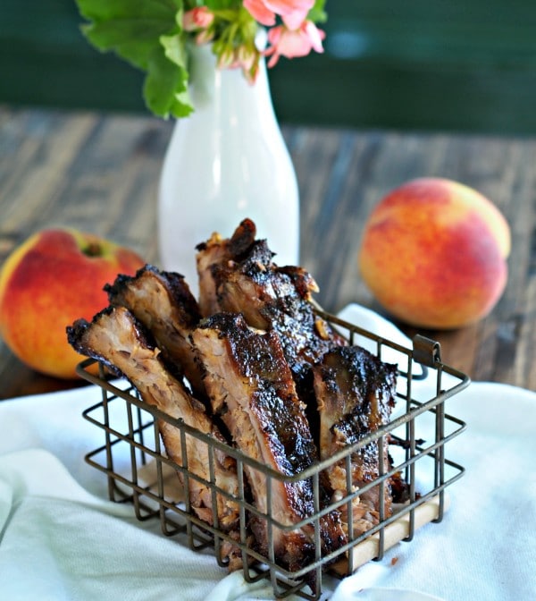 Peach Bourbon Baby Back Ribs. The BEST RIBS EVER!! Perfectly seasoned, fall-off-the-bone, tender ribs baked then grilled with peach bourbon barbecue sauce. Simply Sated