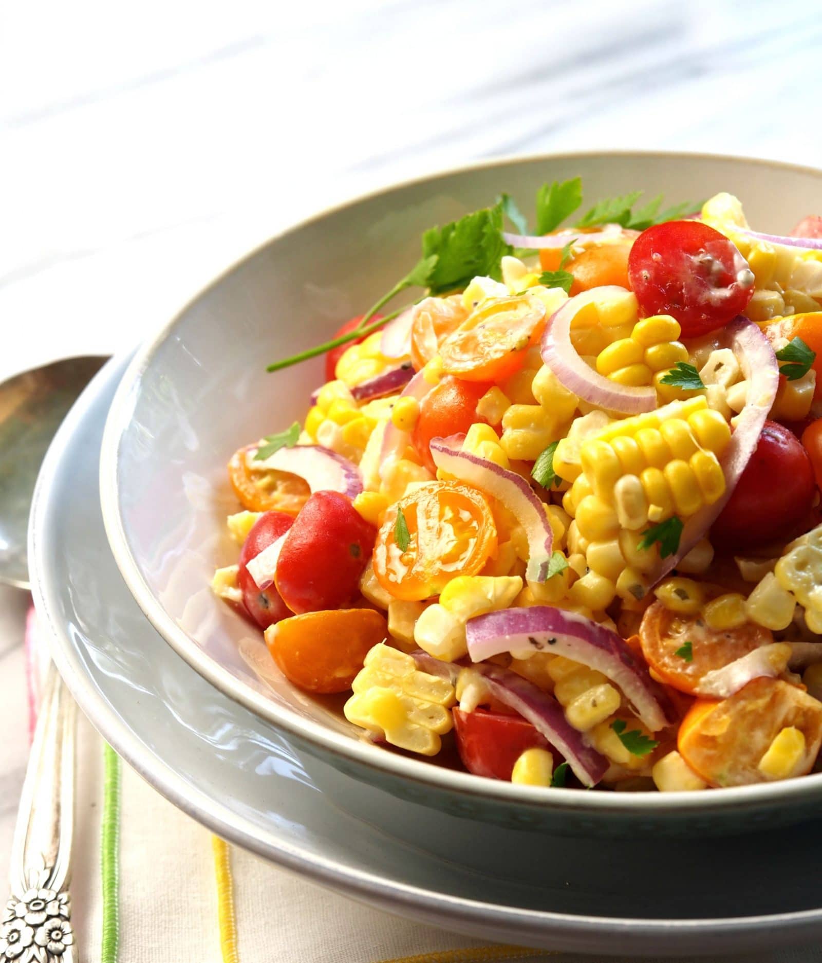 Market Fresh Corn Salad. The BEST of corn salads use the freshest ingredients: corn straight off the cob & summer tomatoes. Summer captured in a bowl. Simply Sated