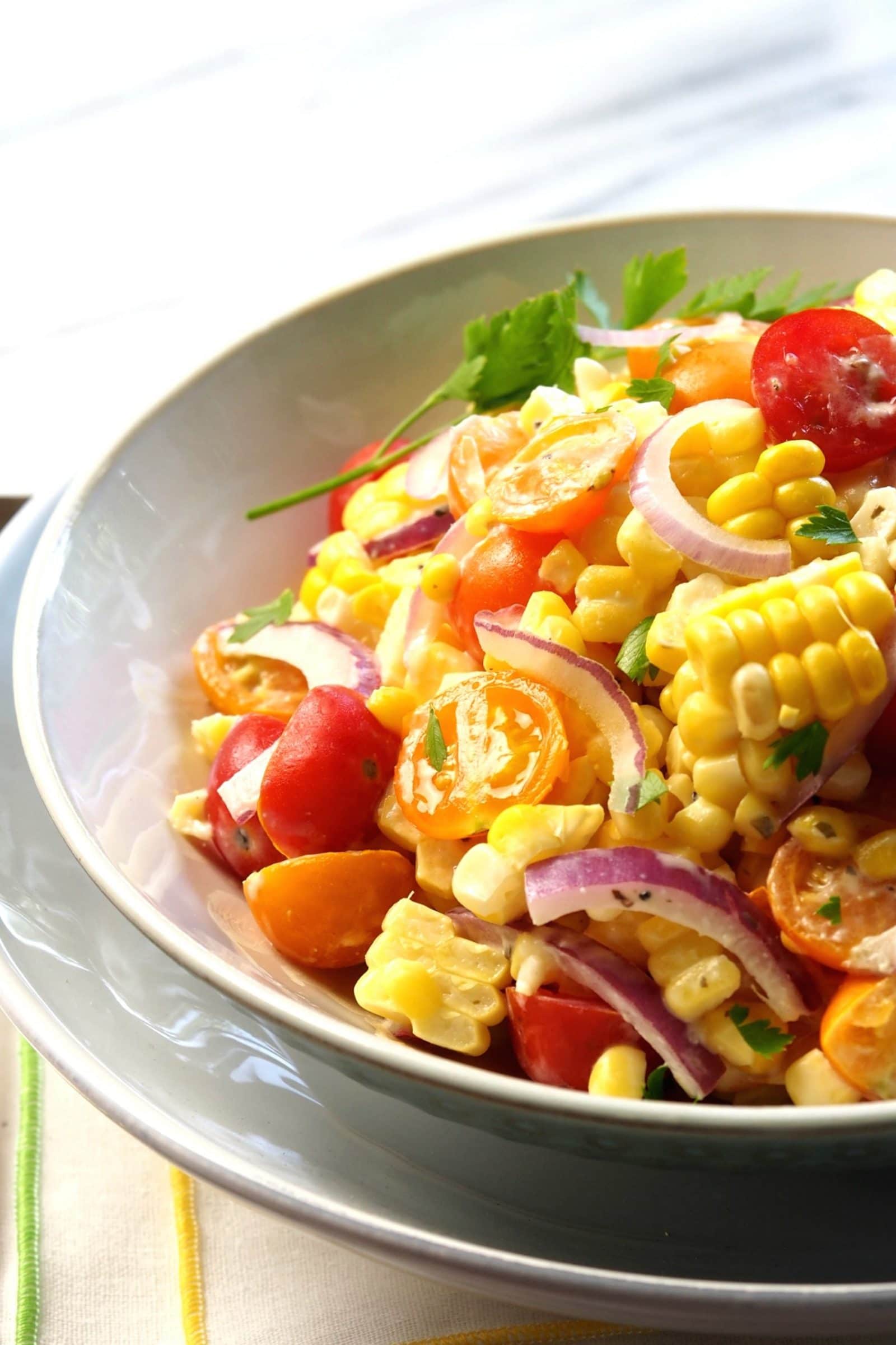 Market Fresh Corn Salad. The BEST of corn salads use the freshest ingredients: corn straight off the cob & summer tomatoes. Summer captured in a bowl. Simply Sated