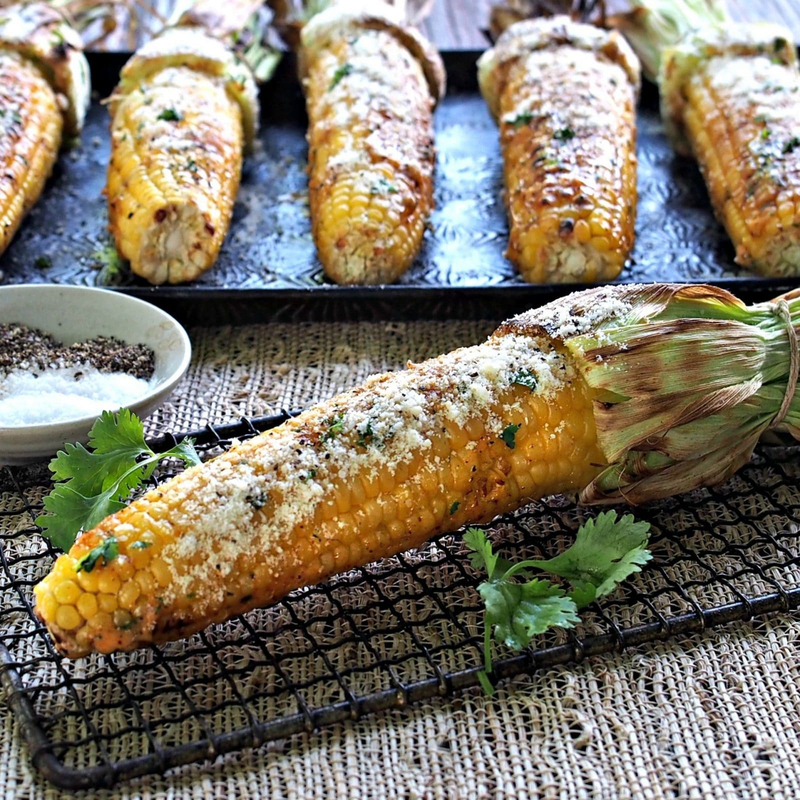 Grilled Corn - smoky, sweet and fresh, this corn-on-the-cob has all the flavors great corn should. Serve as-is or brush with your favorite condiment. Simply Sated