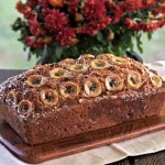 Orange Spice Banana Bread & Muffins. The BEST Banana Bread-ever! Moist & flavorful with toasted pecans, orange zest, cinnamon, nutmeg & caramelized bananas. Simply Sated