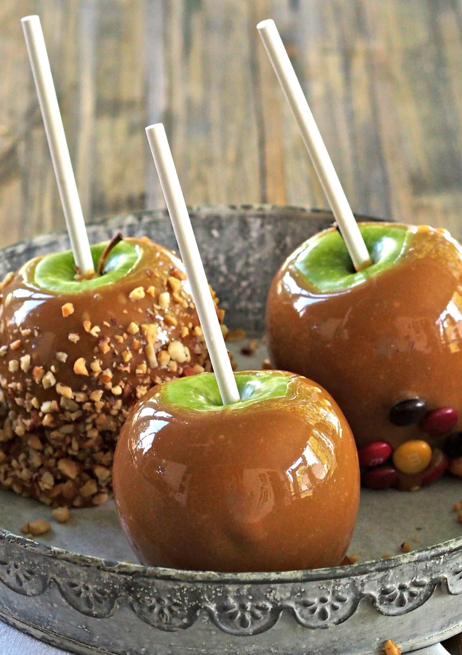 Classic Caramel Apples. Young or old - everyone's most-loved fall treat. Juicy, tart apples smothered in melted caramel then dipped in favorite toppings. Simply Sated