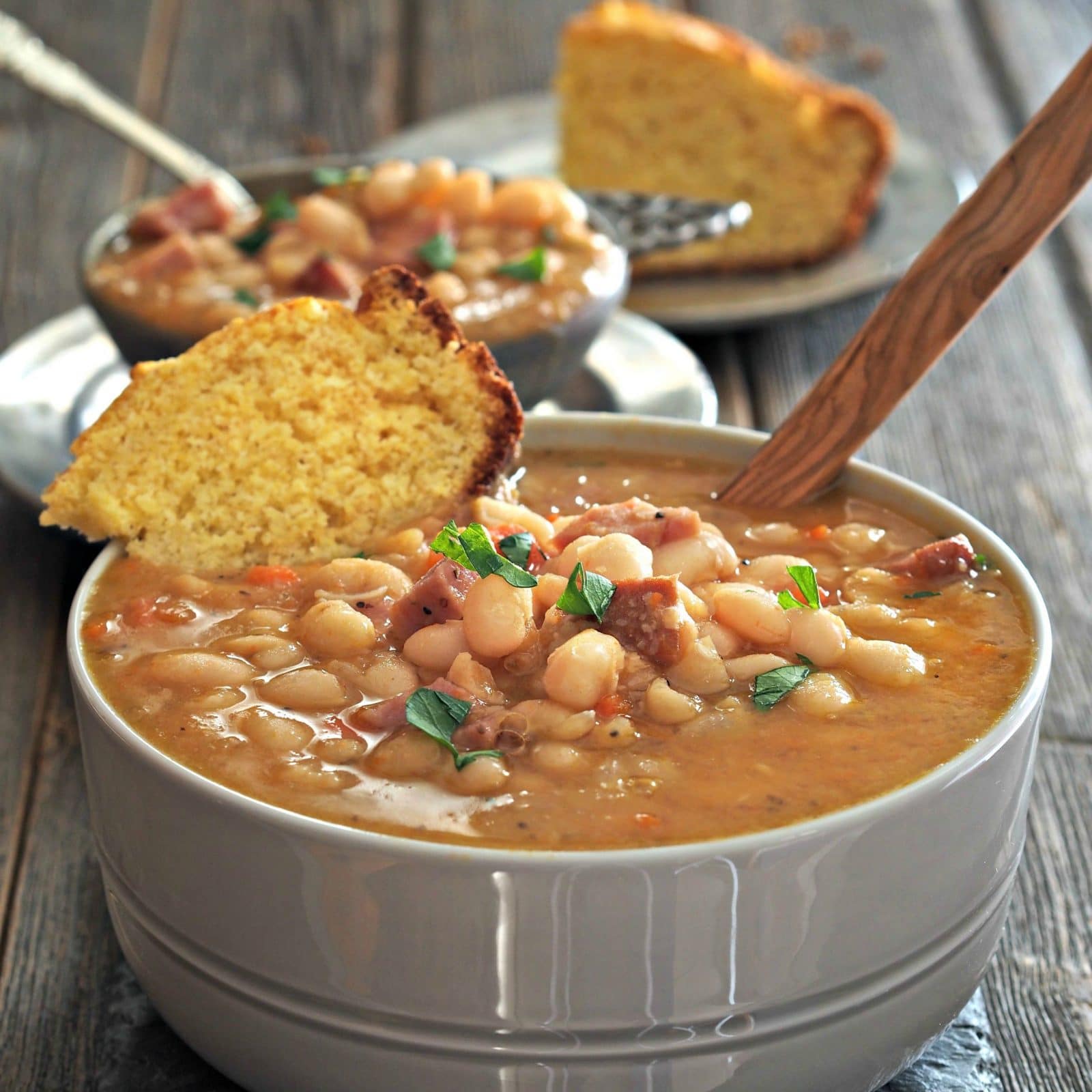 Classic Ham & Bean Soup. White beans & ham simmered w/onions, carrots, seasonings and a few secret ingredients until magic happens. Soups on folks! Simply Sated