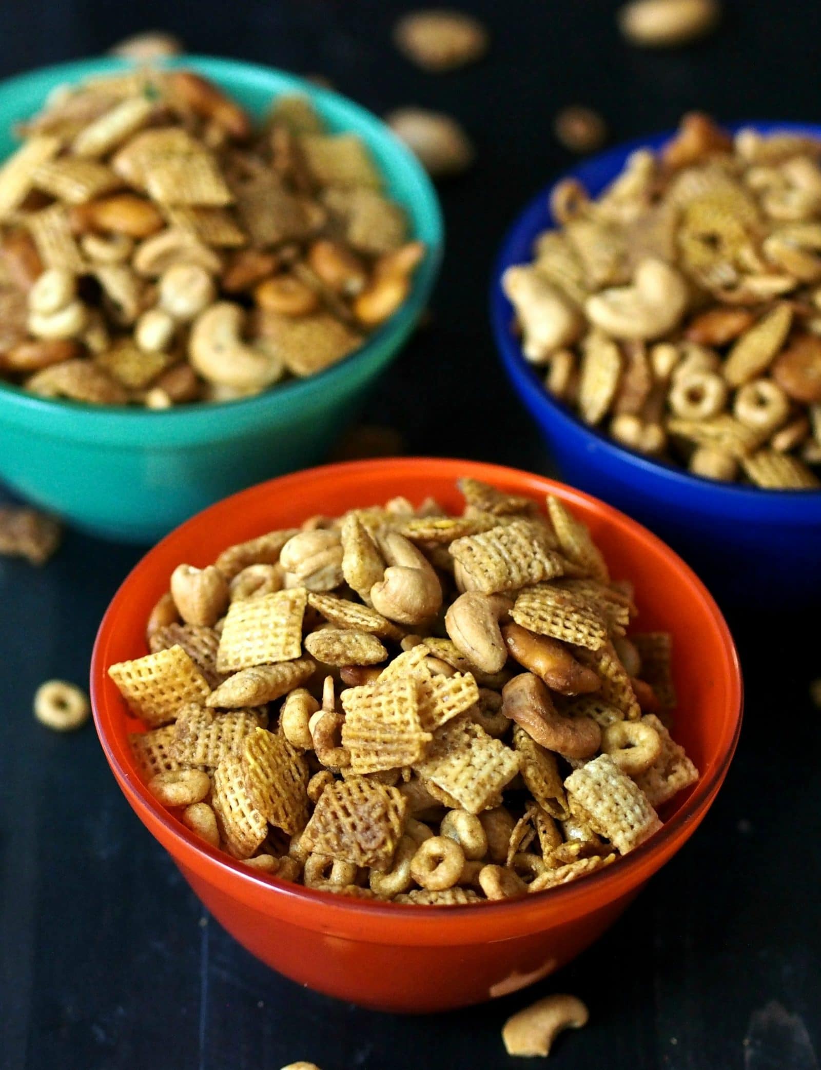 My Famous Chex Party Mix. Original and Honey flavored Chex and Cheerios, cashews and pretzels combined with the perfect seasonings. This stuff is addicting. Simply Sated