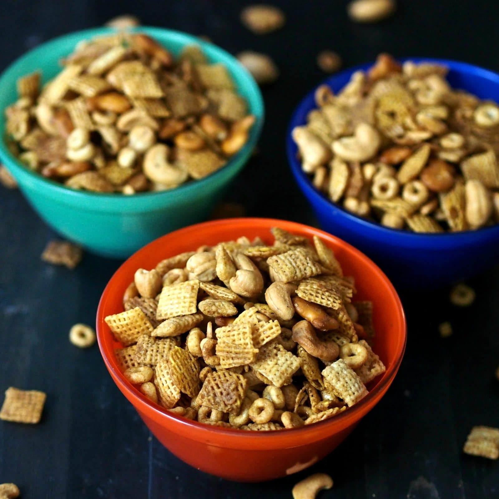 My Famous Chex Party Mix. Original and Honey flavored Chex and Cheerios, cashews and pretzels combined with the perfect seasonings. This stuff is addicting. Simply Sated