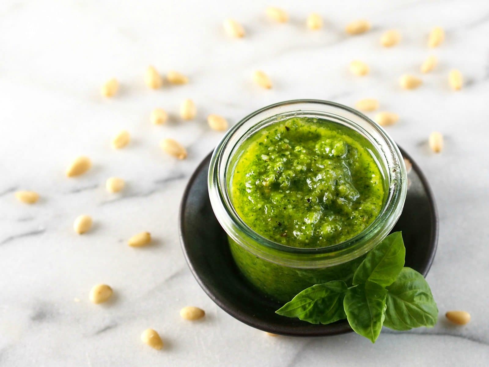 Basic Pesto. The perfect pesto recipe to use as the base to create your favorite pesto - just substitute other greens, nuts, cheeses and seasonings. Simply Sated