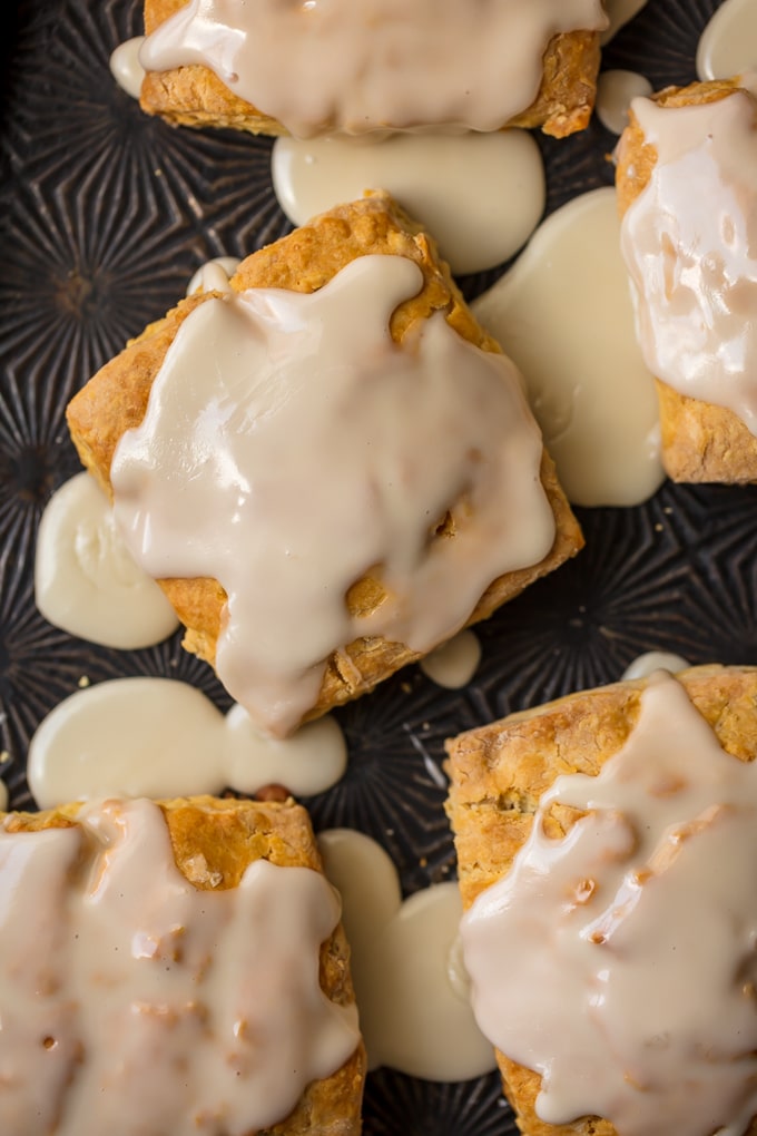 Maple Oat Scones. A slightly sweet, crunchy (on the outside), tender (on the inside) scone filled with oats and topped with maple glaze. Simply Sated