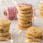 Cranberry Orange Almond Shortbread Cookies. Cranberries, oange zest, honey almonds all rolled up in an easy shortbread cookie dough. A perfect sweet treat. Simply Sated