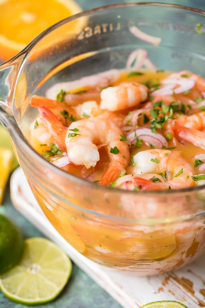 Secret Ingredient Shrimp Cocktail (Ceviche de Camaron) is made by marinating cooked shrimp in citrus juices and adding onion, jalapenos, ketchup and a few other ingredients. The secret ingredient in this shrimp cocktail is using orange & lime juices which results in the best shrimp cocktail - anywhere. Enjoy! Simply Sated