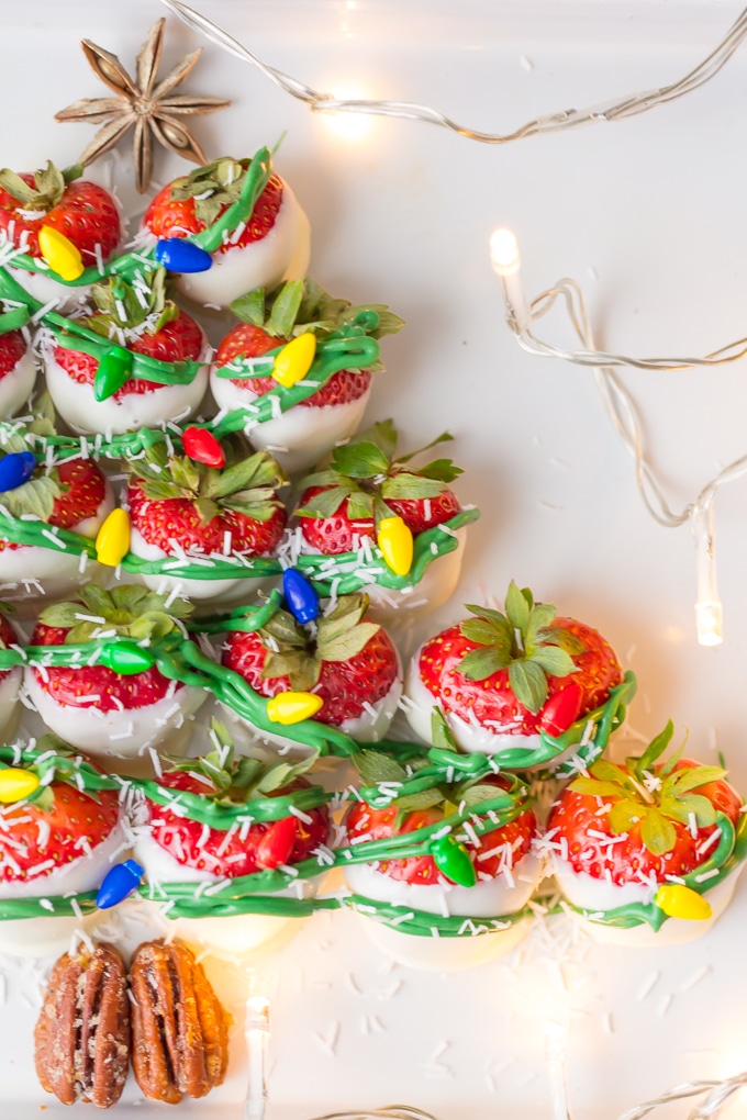 White Chocolate Strawberries Christmas Tree-a whimsical, easy & tasty Christmas dessert or appetizer. White chocolate and strawberries. Everyone's favorite. Simply Sated