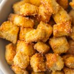 If you want homemade croutons in your life (and you do), Homemade Garlic Parmesan Croutons are THE choice. They are crispy, yet tender, with a hint of garlic and the perfect amount of Parmesan. They aren't only great on salad, they make a terrific snack. Simply Sated