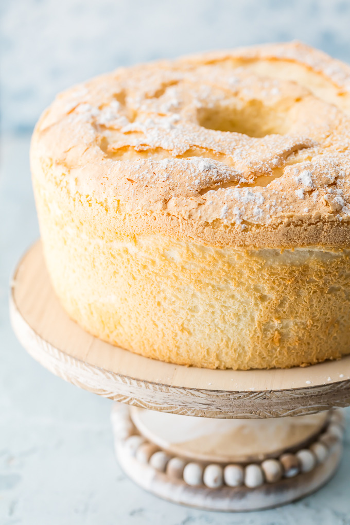 Game-Changing Angel Food Cake is truly game-changing. It is no-fuss and has a velvety, melt-in-your-mouth texture with a slightly crunchy top. It is just as delicious served with or without any toppings. This cake is the only Angel Food Cake one will ever need and is the best Angel Food Cake recipe - ever! Simply Sated