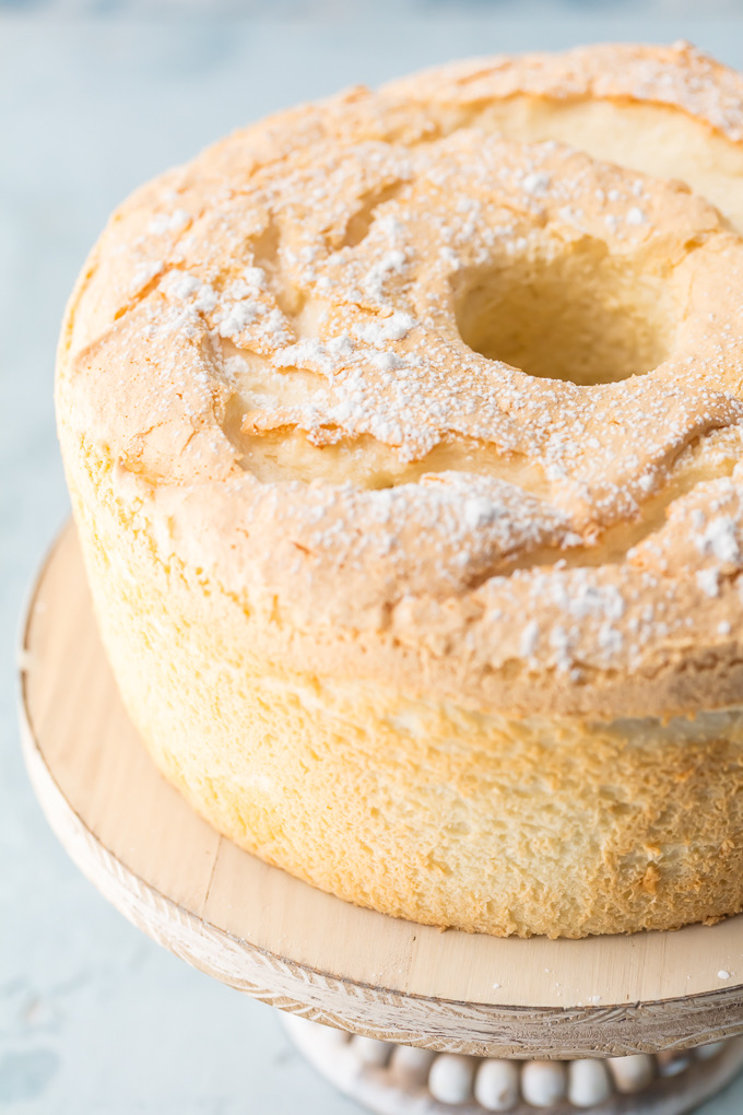 Game-Changing Angel Food Cake is truly game-changing. It is no-fuss and has a velvety, melt-in-your-mouth texture with a slightly crunchy top. It is just as delicious served with or without any toppings. This cake is the only Angel Food Cake one will ever need and is the best Angel Food Cake recipe - ever! Simply Sated